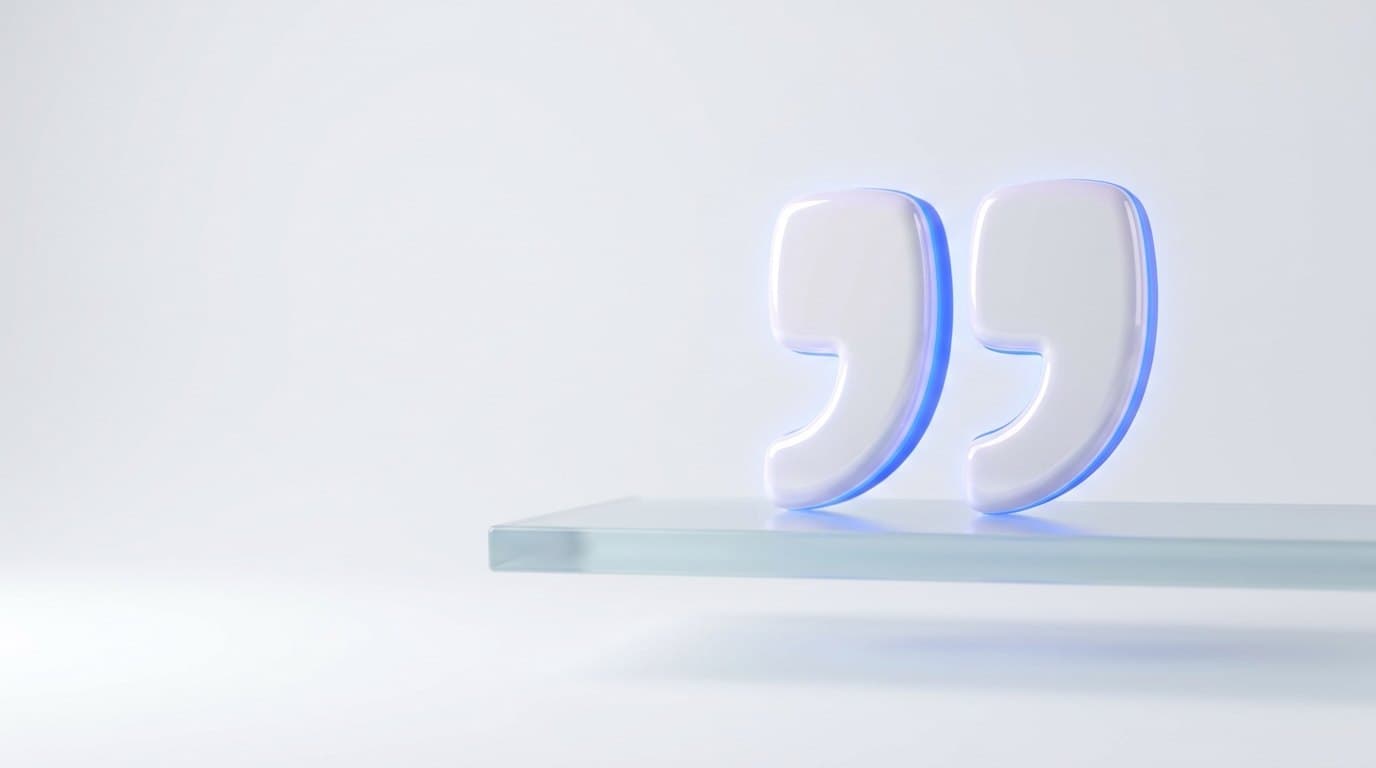A cobalt blue quotation mark carved in ceramic resting on a frosted glass shelf, white studio background
